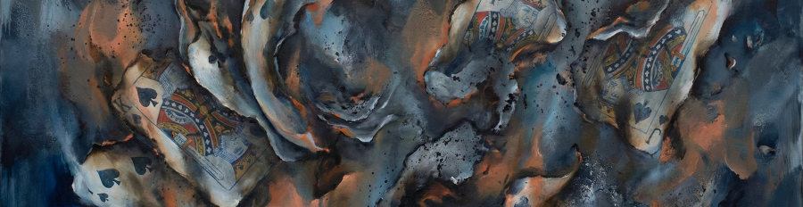 a burning house of cards